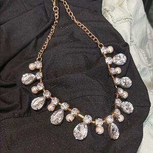 Elegant Gold and Silver Necklace with Pearls